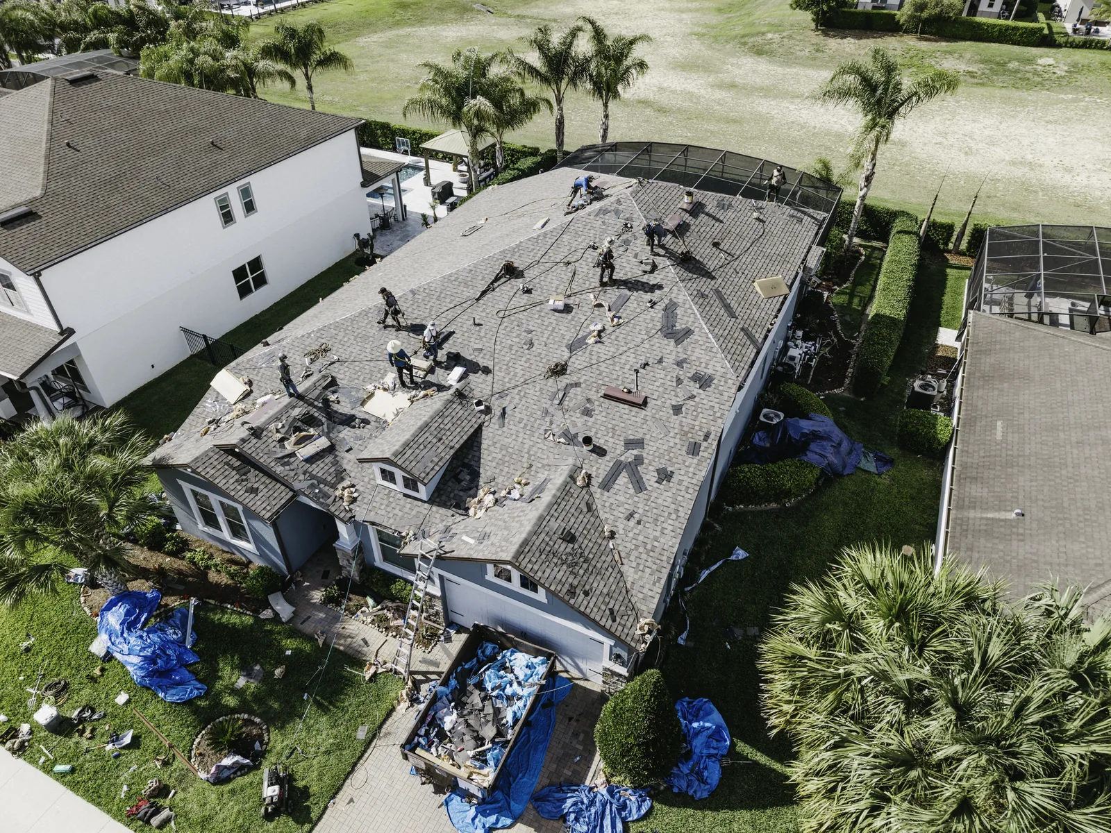 Close aerial view of a residential roof under repair