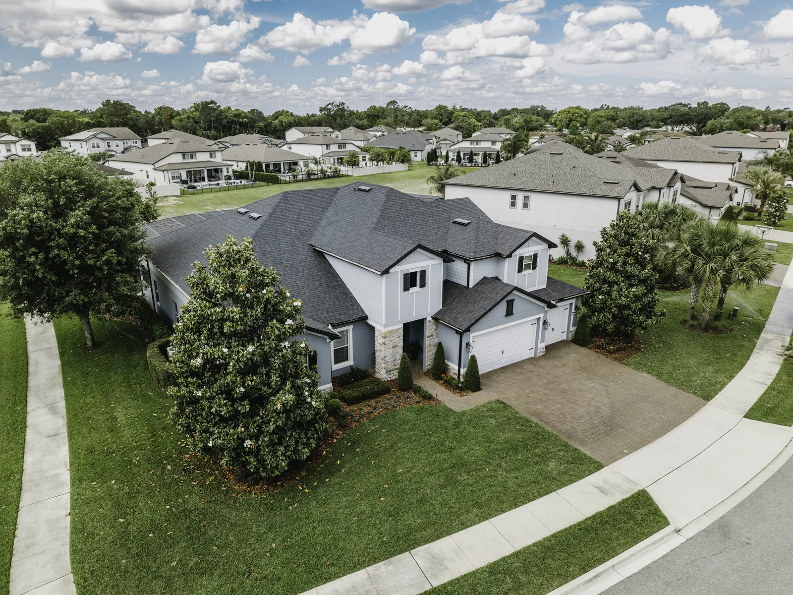 Illustrative aerial view of a completed shingle roof in Central Florida