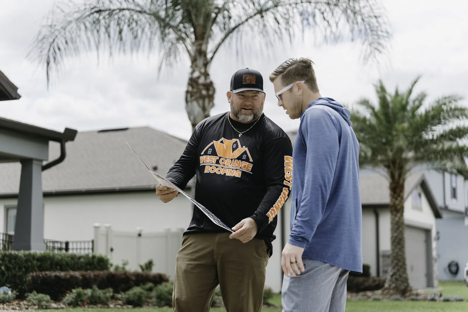 Roofing consultant reviewing project documents