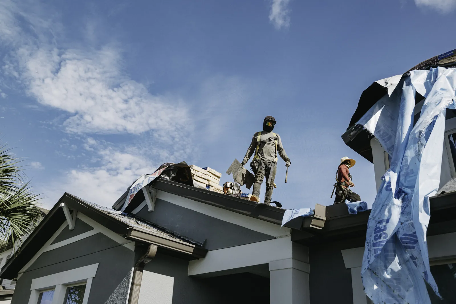 West Orange Roofing crew working on a residential roof