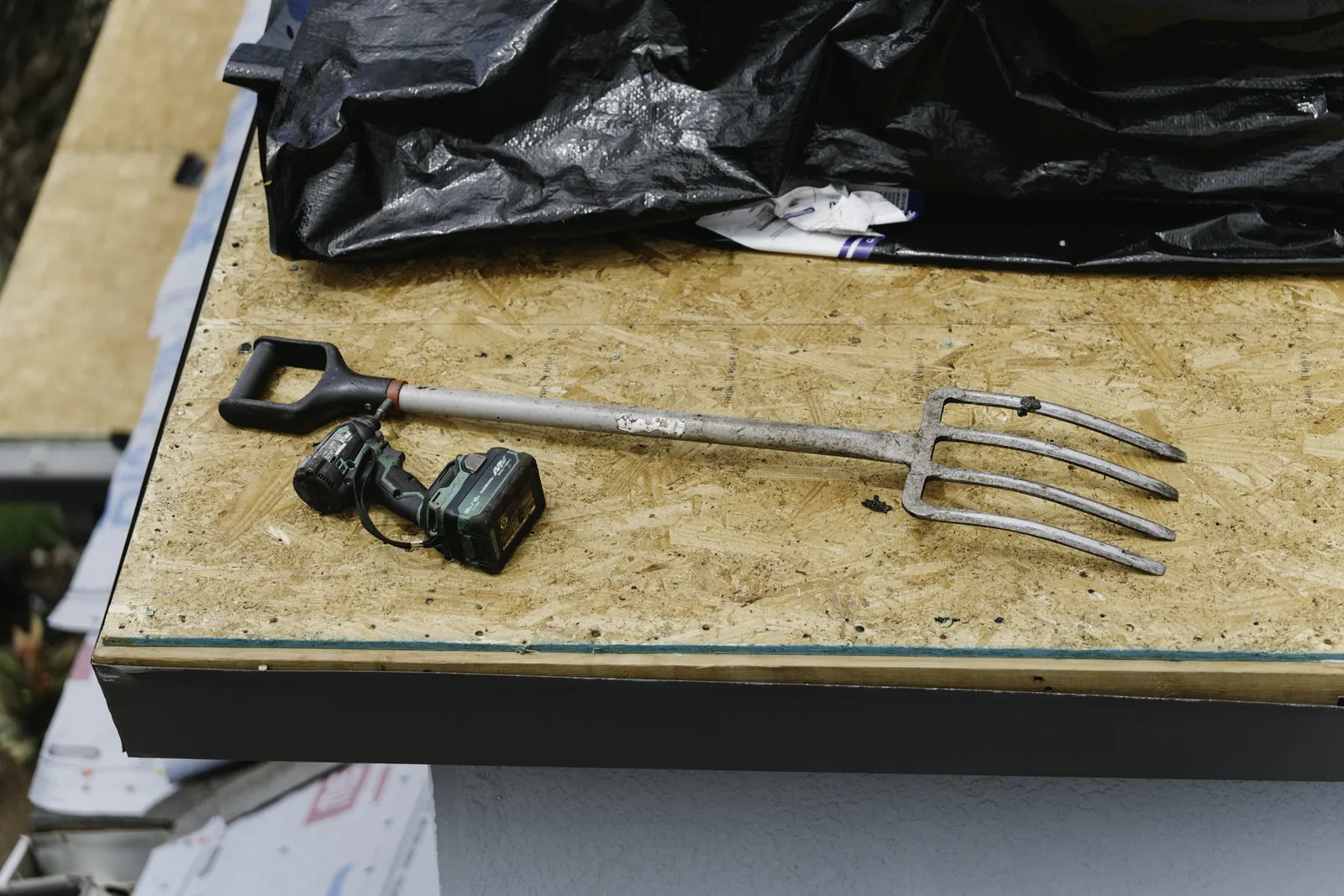 Professional roofing hand tools arranged for a project
