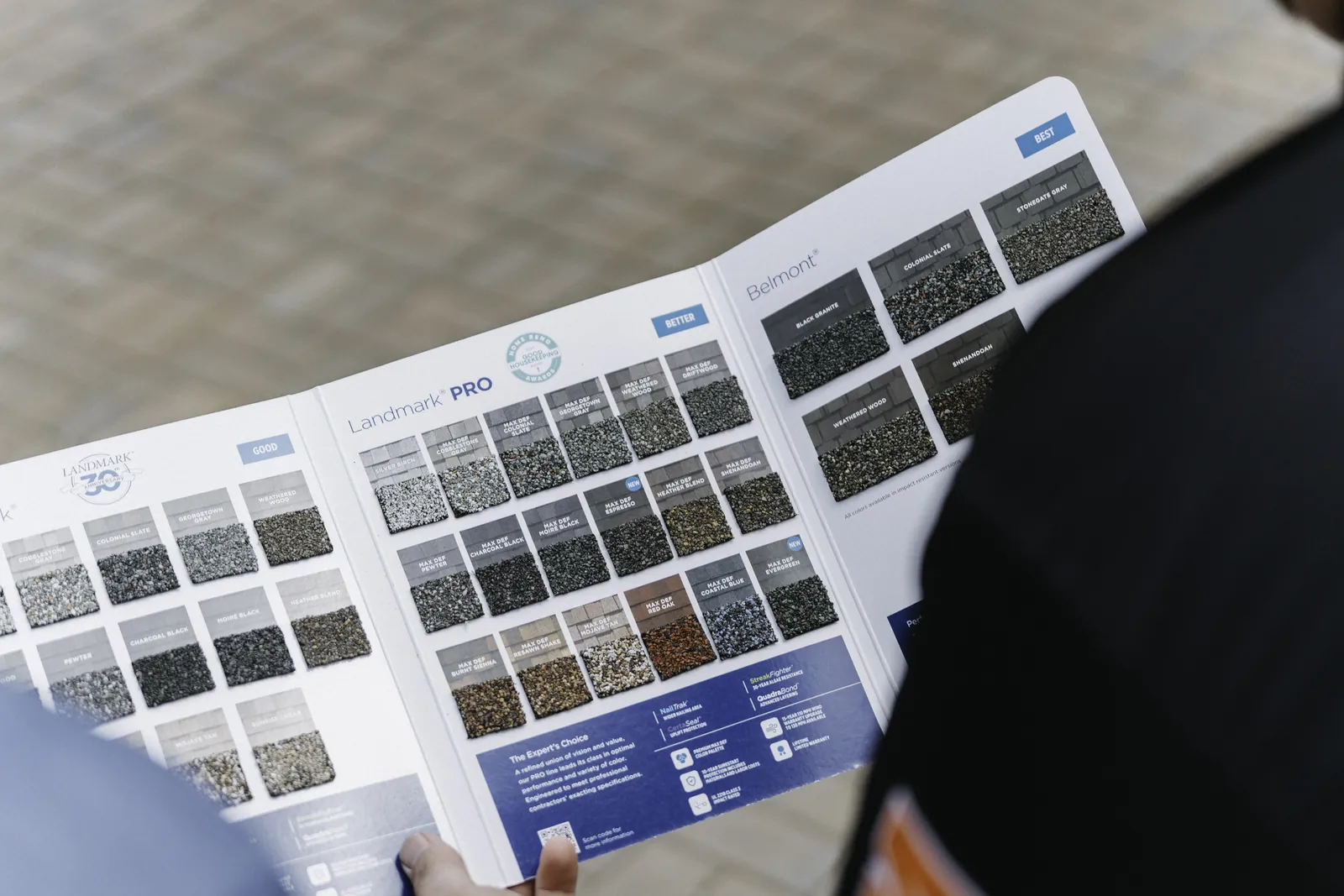 Shingle color samples arranged for a roofing selection