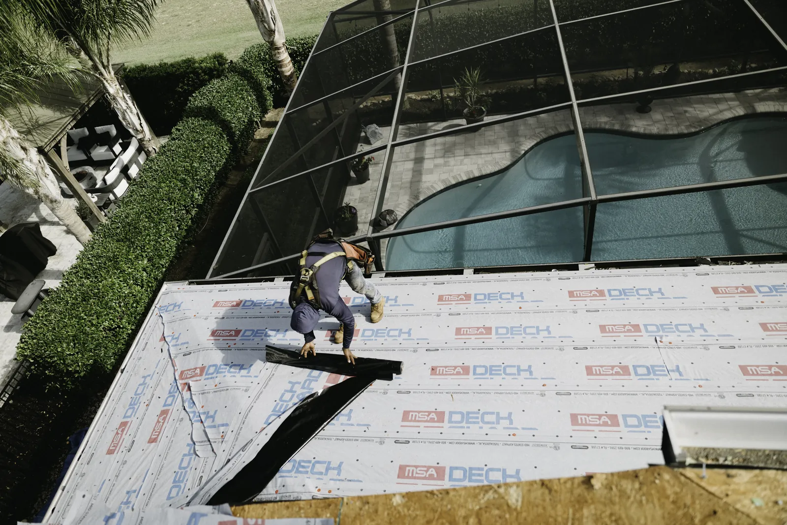 Protective underlayment being installed on a Florida home