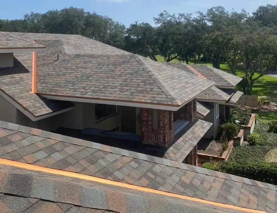 A customized asphalt shingle roof on a home in West Orange Florida.