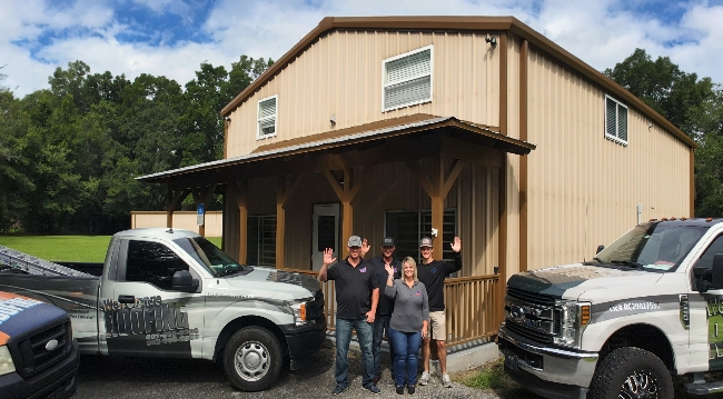 The Williston, Florida West Orange Roofing team in front of the office